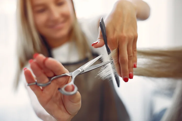 Woman cutting hair